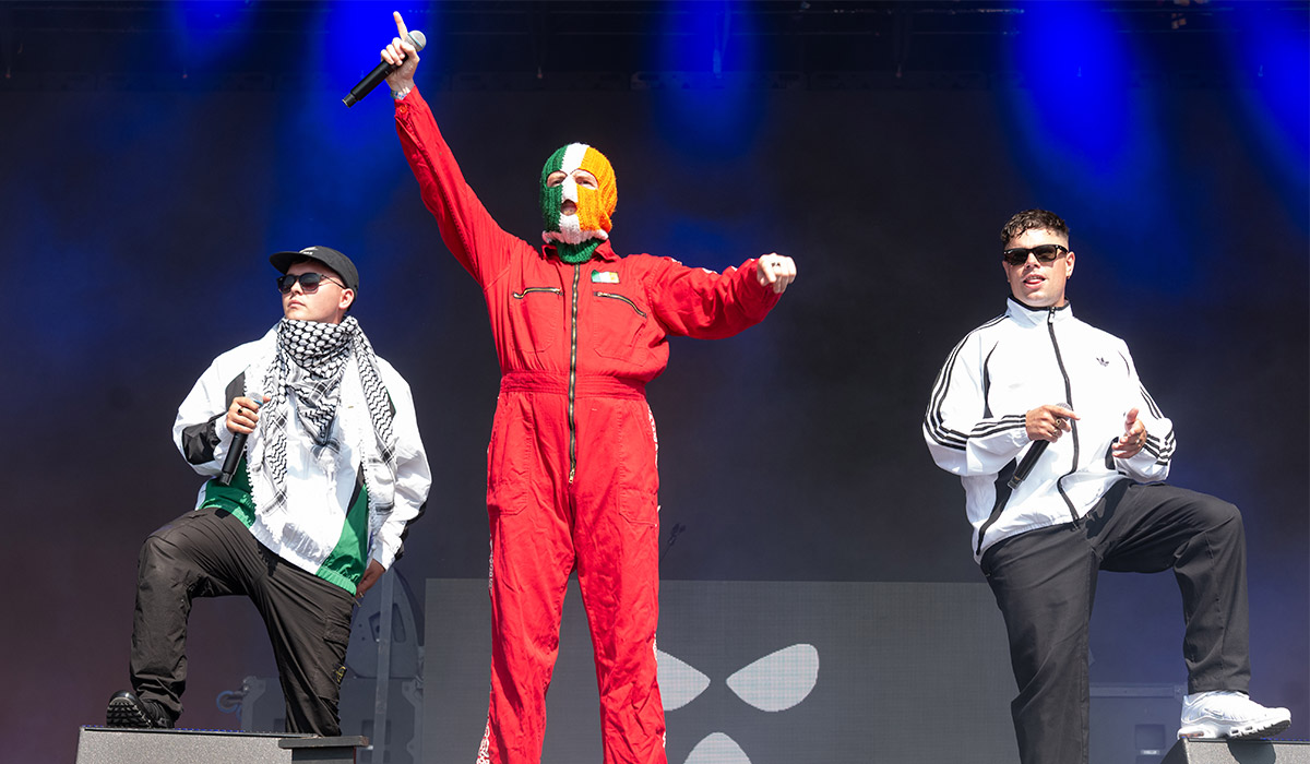 Móglaí Bap, Mo Chara and DJ Provaí of Kneecap performing at Glastonbury