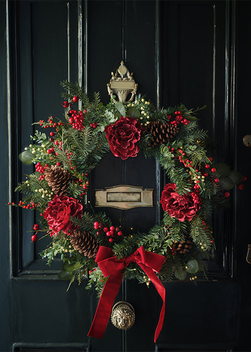 Paul Costelloe marks 20 years with Dunnes Stores with nostalgic Christmas collection 8 RED BOW WREATH, €60 / 50. Pic: Dunnes Stores