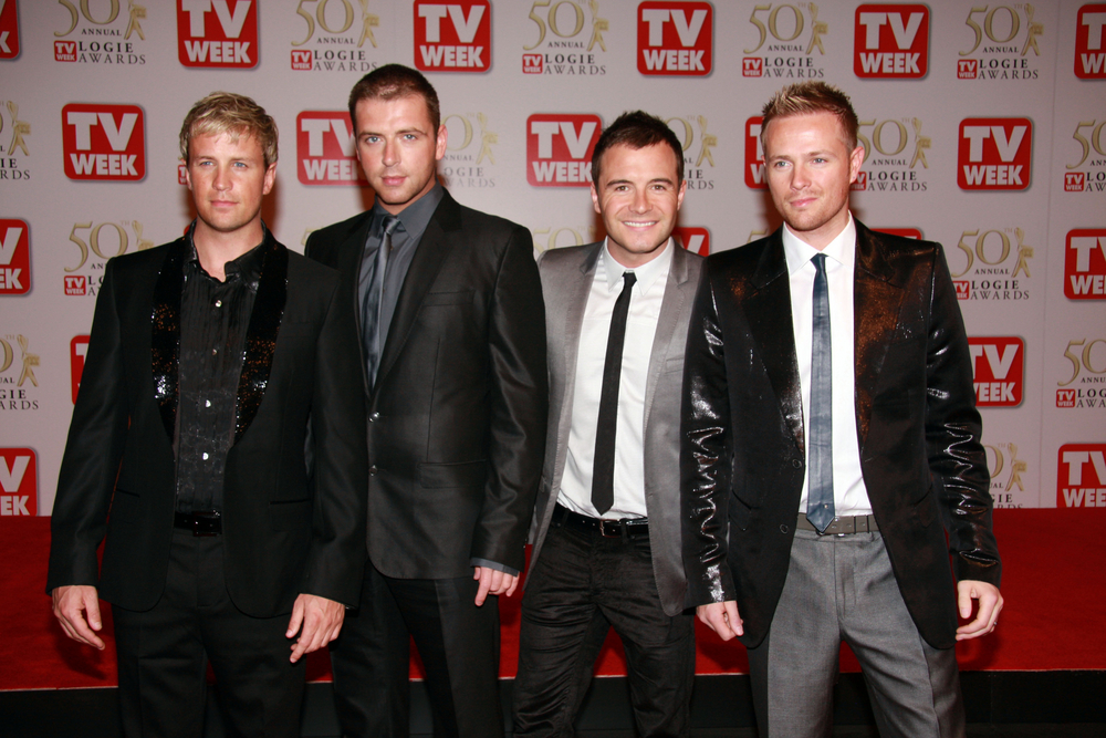 Westlife members Nicky Byrne, Kian Egan, Mark Feehily and Shane Filan in 2008. Flash Studio, Shutterstock