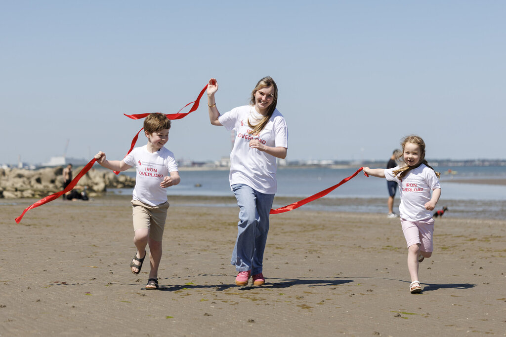 Teddy Eustace (8) and Emilia Eustace (5) alongside campaign supporter living with haemochromatosis Alice Kelly. Picture Andres Poveda