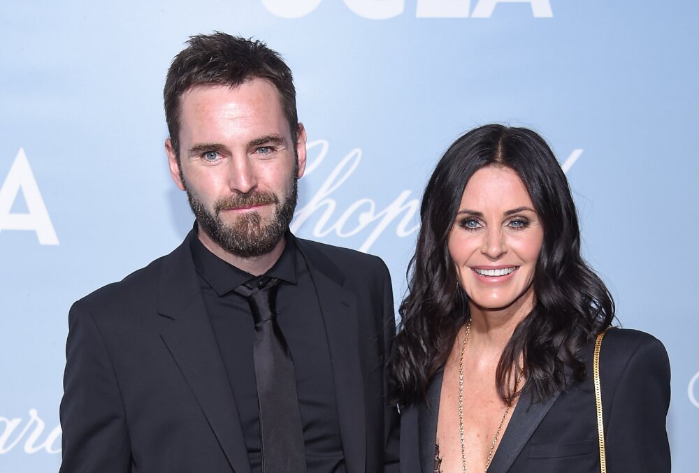 Courteney Cox, Johnny McDaid. DFree, Shutterstock