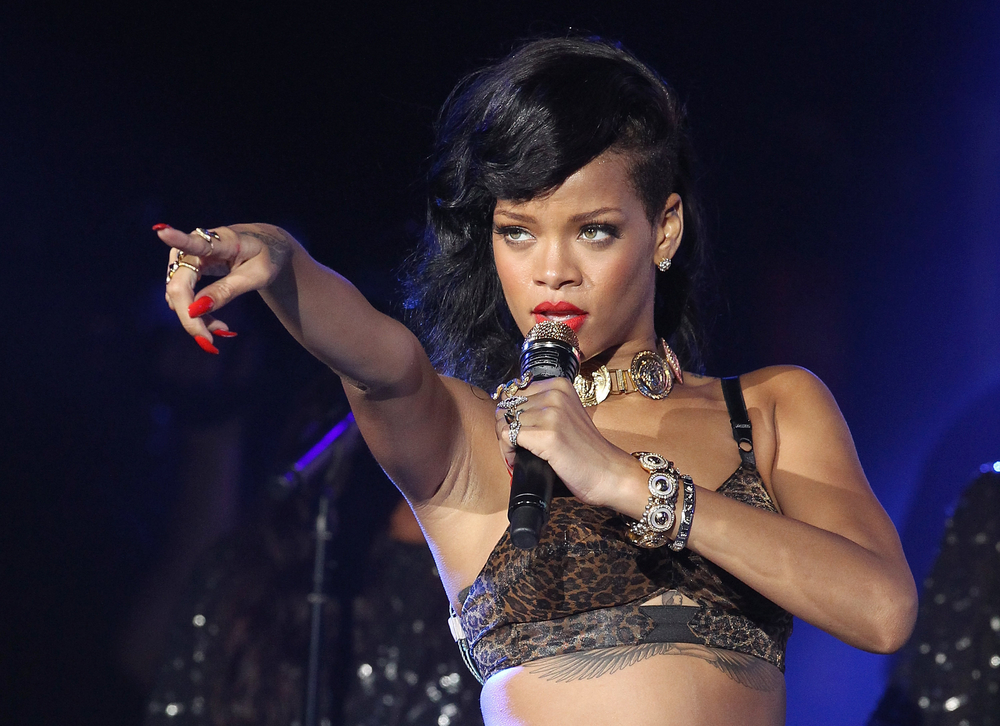 Rihanna wrote some 2010's iconic heartbreak songs, witha few hits focusing on cheating. Shutterstock