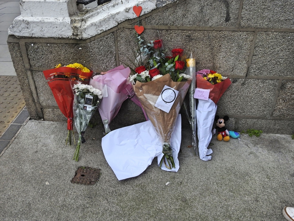Dublin: Man Found Guilty Of Attempted Murder Of 3 Children 3 Flowers on Parnell Square near Gaelscoil Colaiste Mhuire, where there was an attack on the school's children on 23rd November. Derick P. Hudson, Shutterstock