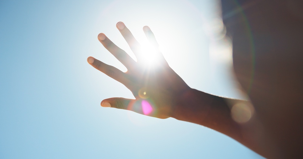Sun, Person, outdoor and hand in sunshine with glare, eye protection and blue sky