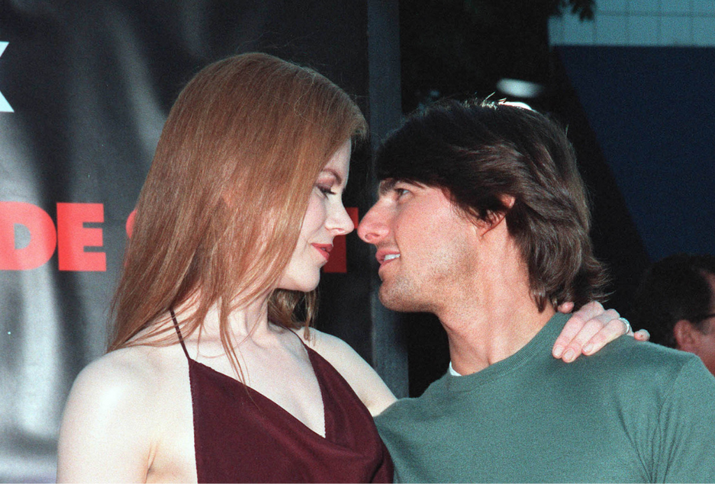 Tom Cruise and Nicole Kidman attend 1999 movie premiere. Photo credit: Featureflash Photo Agency, Shutterstock