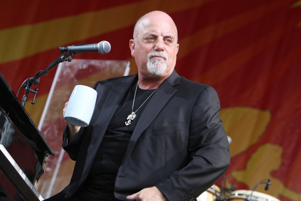 Billy Joel performs at the 2013 New Orleans Jazz and Heritage Festival. Photo credit: Adam McCullough, Shutterstock